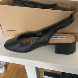 Steven Madden sling back flats.